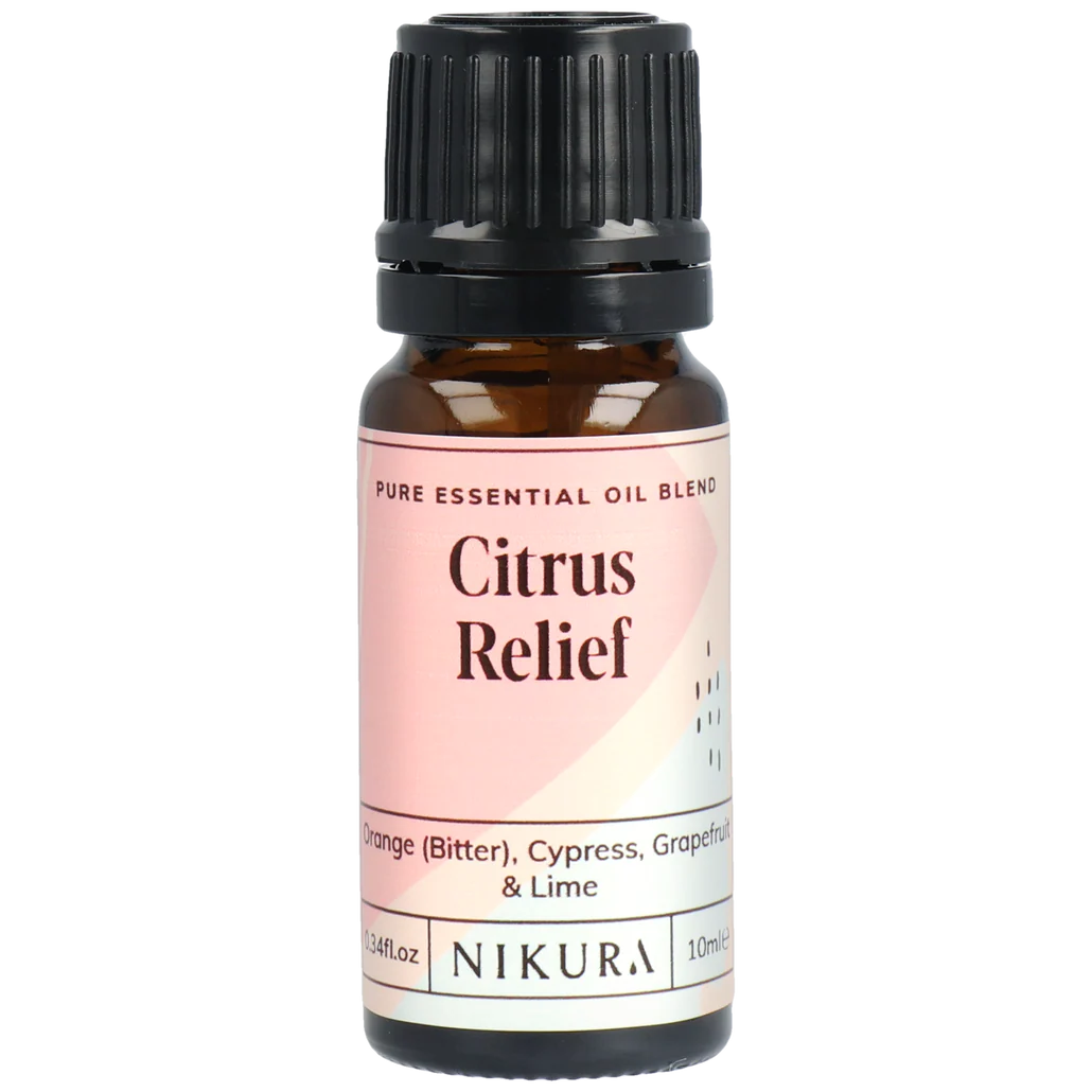 Nikura Citrus Relief essential oil bottle on a white background by White Cove UK