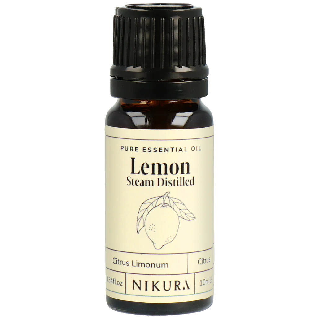 Nikura lemon essential oil bottle on a white background by White Cove UK