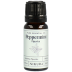 Nikura peppermint essential oil bottle on a white background by White Cove UK