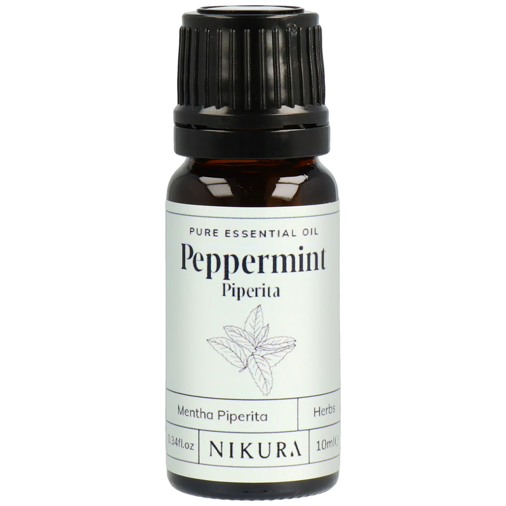 Nikura peppermint essential oil bottle on a white background by White Cove UK