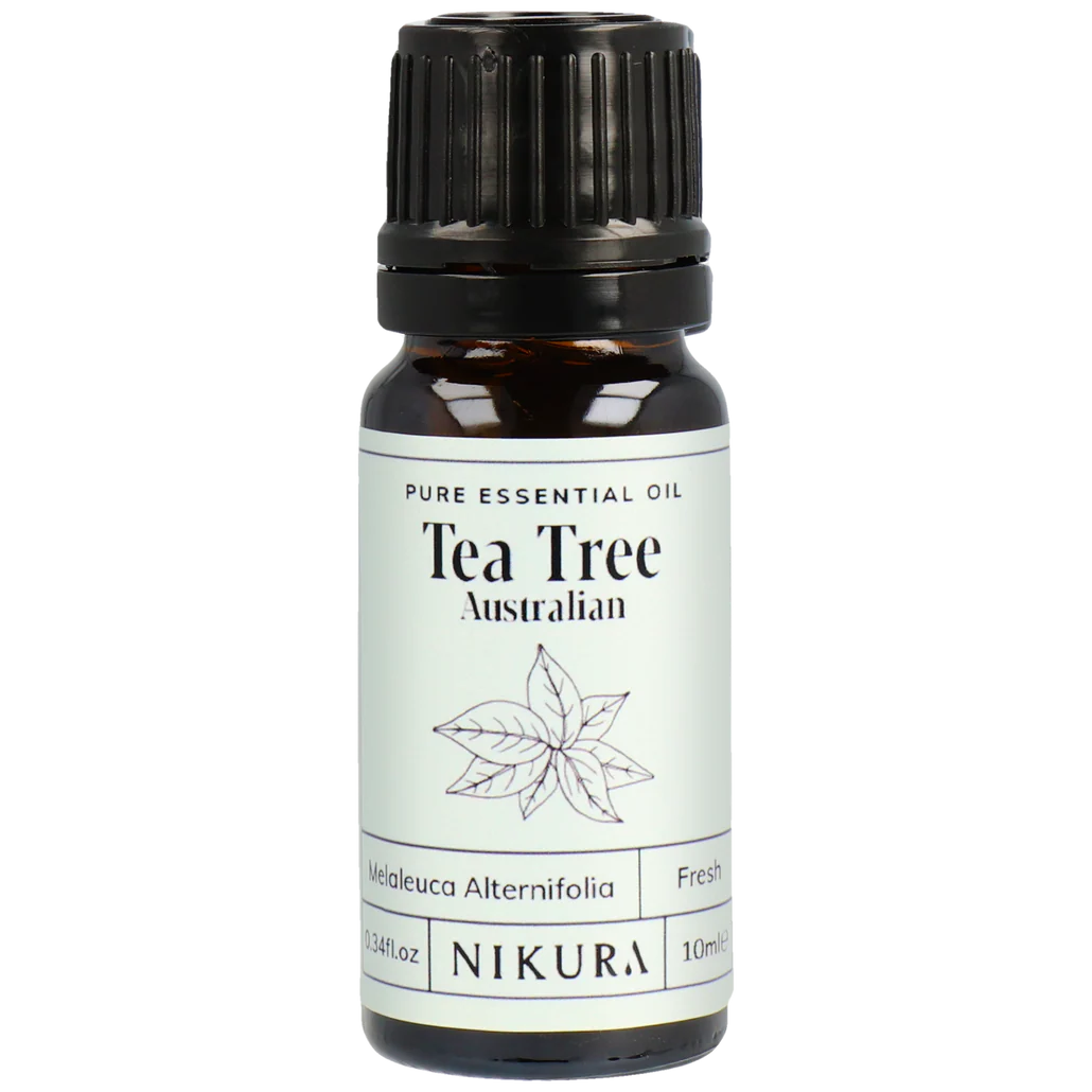 Tea Tree essential oil bottle with black cap on a white background by White Cove UK