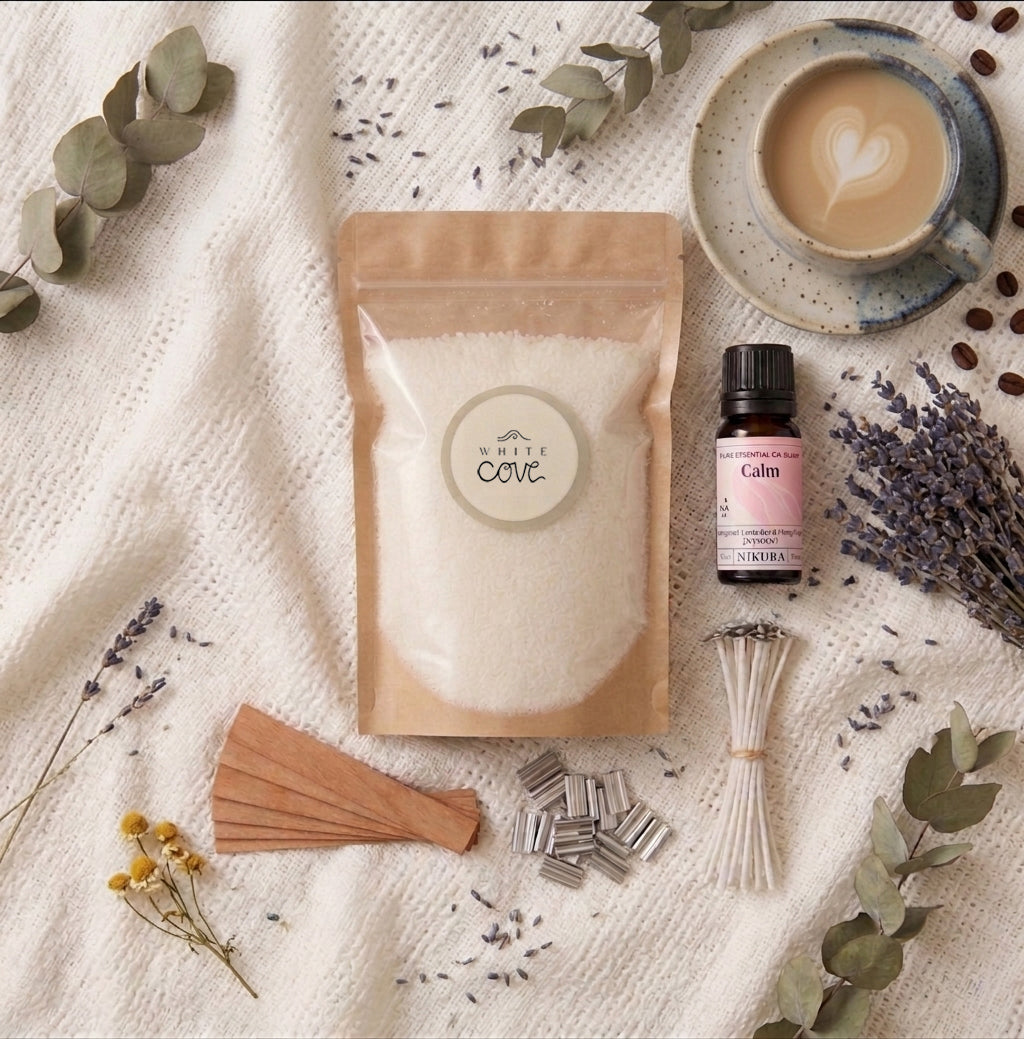 The complete Slow Down sustainable candle kit by White Cove UK featuring refillable plant-based candle sand. This tranquil morning flat lay showcases the full ritual ecosystem with Relax & Unwind fragrance oil, wooden wicks, and artisan ceramics, beautifully arranged for a mindful living aesthetic