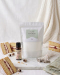 A white cove candle sand  'HAPPY BIRTHDAY' edition, with cotton wick and 'Choose Your Scent' essential oil. Birthday presents made simple and full of love.