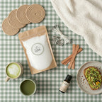 Creating a mindful morning routine with a sustainable candle making kit by White Cove UK. Featuring plant-based wax sand, dual wick options, natural woven coasters, and an uplifting Positivity fragrance oil, displayed with a healthy breakfast aesthetic