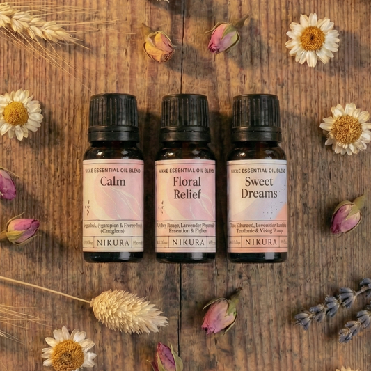 Premium botanical essential oil collection for White Cove UK refillable candles. This sleep-focused bundle includes three Nikura blends—Calm, Floral Relief, and Sweet Dreams—surrounded by natural dried florals to showcase the sustainable home fragrance ritual